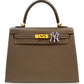 Brown handbag with a gold clasp and Yankees logo on a white background, collection-preview