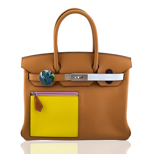 Brown handbag with a yellow patch and visible brand logo on a white , collection-previewbackground