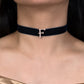 Black velvet choker with a decorative 'F' charm worn by a model.