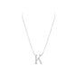 Silver necklace with a 'K' pendant on a white background