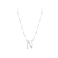 Silver necklace with a 'N' pendant on a white background