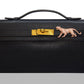 Black leather briefcase with gold lion emblem on a white background, collection-preview