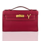Red handbag with gold lock on a white background, collection-preview
