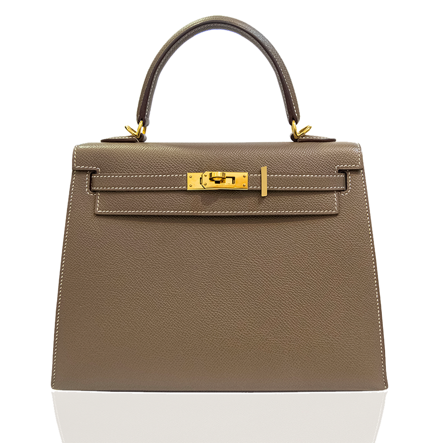 Beige handbag with gold hardware on a white background, collection-preview